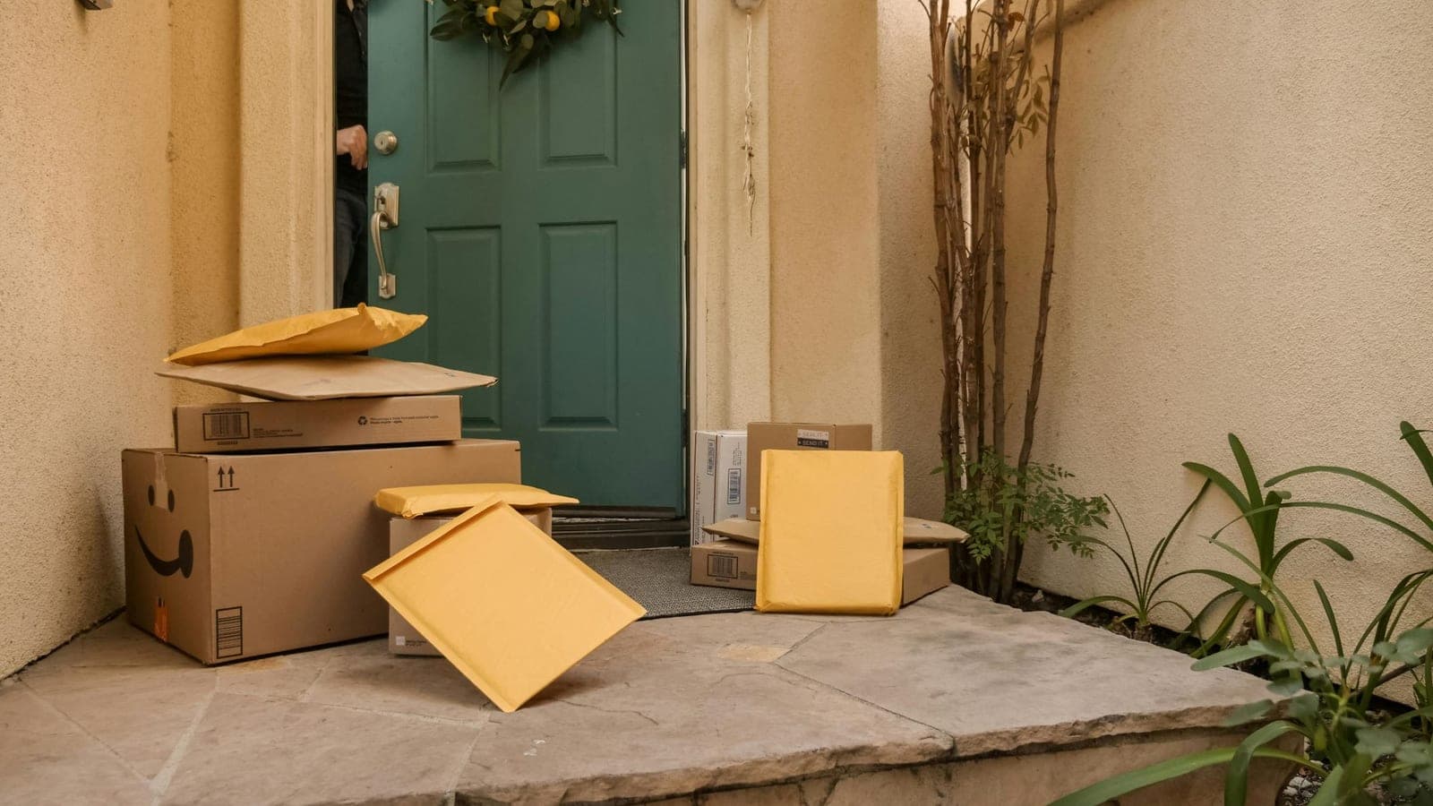 Packages delivered to a front doorstep for no contact delivery
